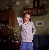 RUSSIA / St.Petersburg / June 2007 / Arina lives with her mother and a sister in a 30 square meter room in a communal appartment. They moved here about a month before this picture was taken after Arina's mother divorced with her father. Before they always had an appartment of their own. 

© Max Sher / Anzenberger