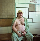 RUSSIA / St.Petersburg / August 2007 / A man relaxing after having a bath in a public bath. In many communal appartments, there is still no hot water so people have to go to public baths to wash. 

© Max Sher / Anzenberger