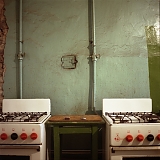 RUSSIA / St.Petersburg / June 2007 / A communal kitchen with two gas stoves. 

© Max Sher / Anzenberger