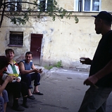 RUSSIA / St.Petersburg / July 2007 / Locals hang out in the street in an area where most housing is communal. 

© Max Sher / Anzenberger